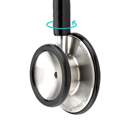 Hrudní snímač fonendoskopu 3M Littmann Classic III se zelenomodrou šipkou označující směr otáčení hrudního snímače.